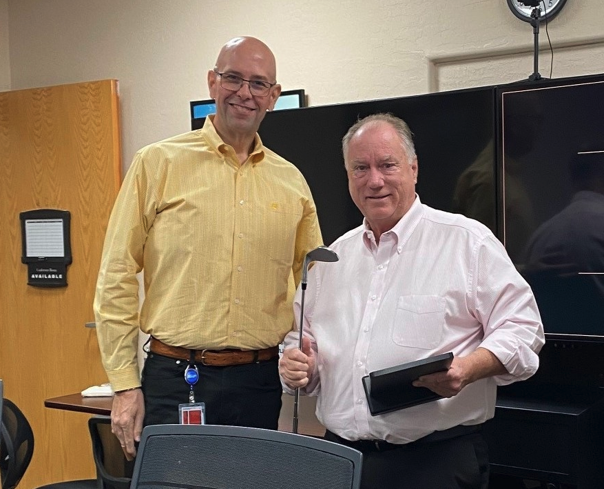 Incoming Chairman, Brian Heath, SRP, presented Steve with a custom plaque and engraved chrome wedge.